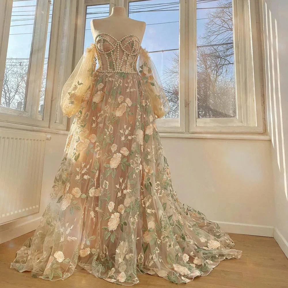 Long sleeved sweet and elegant sheer dance dress adorned with pearls and decals