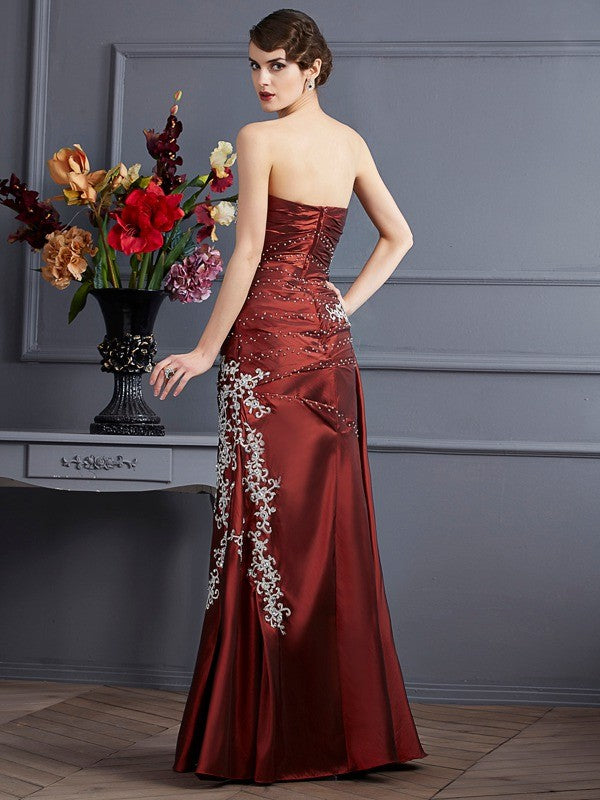 Beautiful cylindrical sleeveless beaded long taffeta dress