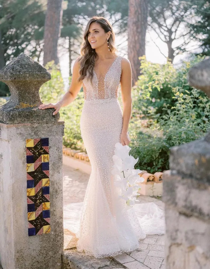 Elegant sweet and sparkling star wedding dresses on trains