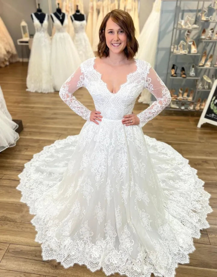 Sweet and elegant A-line V-neck long sleeved church skirt lace wedding dress