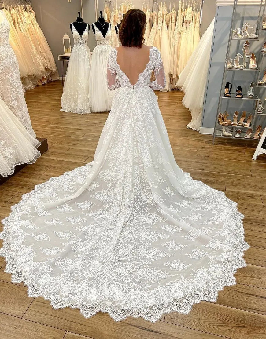 Sweet and elegant A-line V-neck long sleeved church skirt lace wedding dress