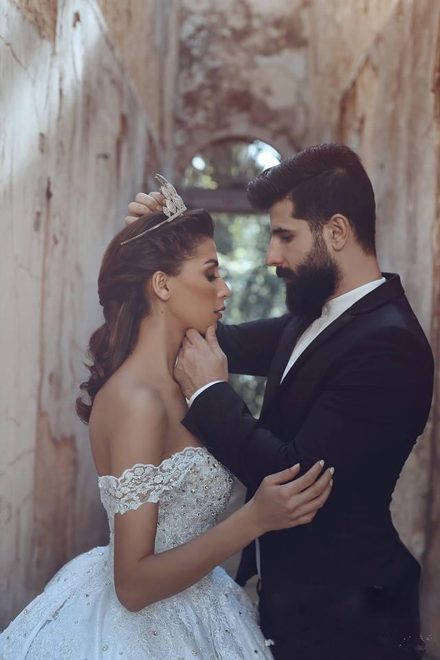 Stunning and elegant long off shoulder lace beaded wedding dress
