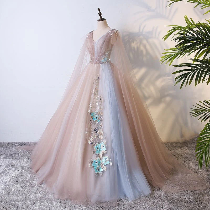 V-neck sheer ball dress with unique embellishments and floor sweeping one-fifth dress