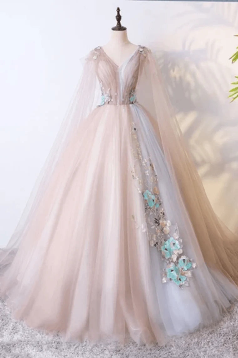 V-neck sheer ball dress with unique embellishments and floor sweeping one-fifth dress
