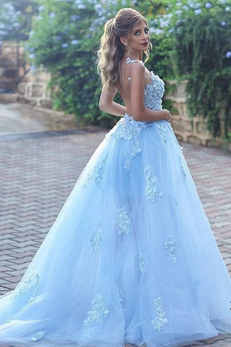 Elegant ball dress with chiffon embellishments on the hem of the skirt