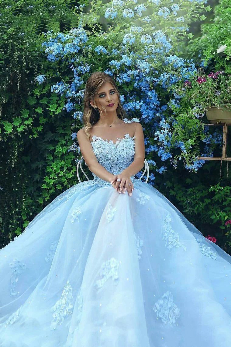 Elegant ball dress with chiffon embellishments on the hem of the skirt