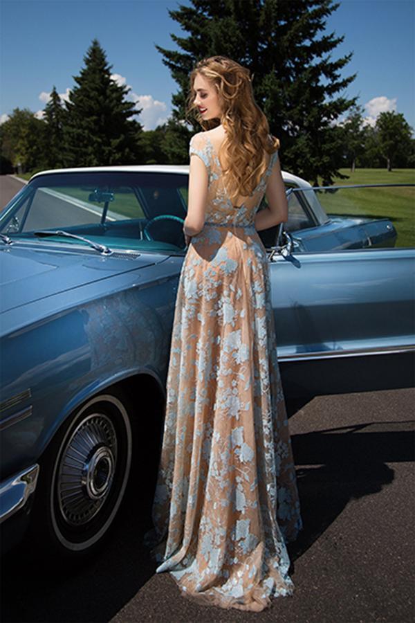 A charming blue lace backless tulle hollowed out floor to ceiling ball dress with sleeves