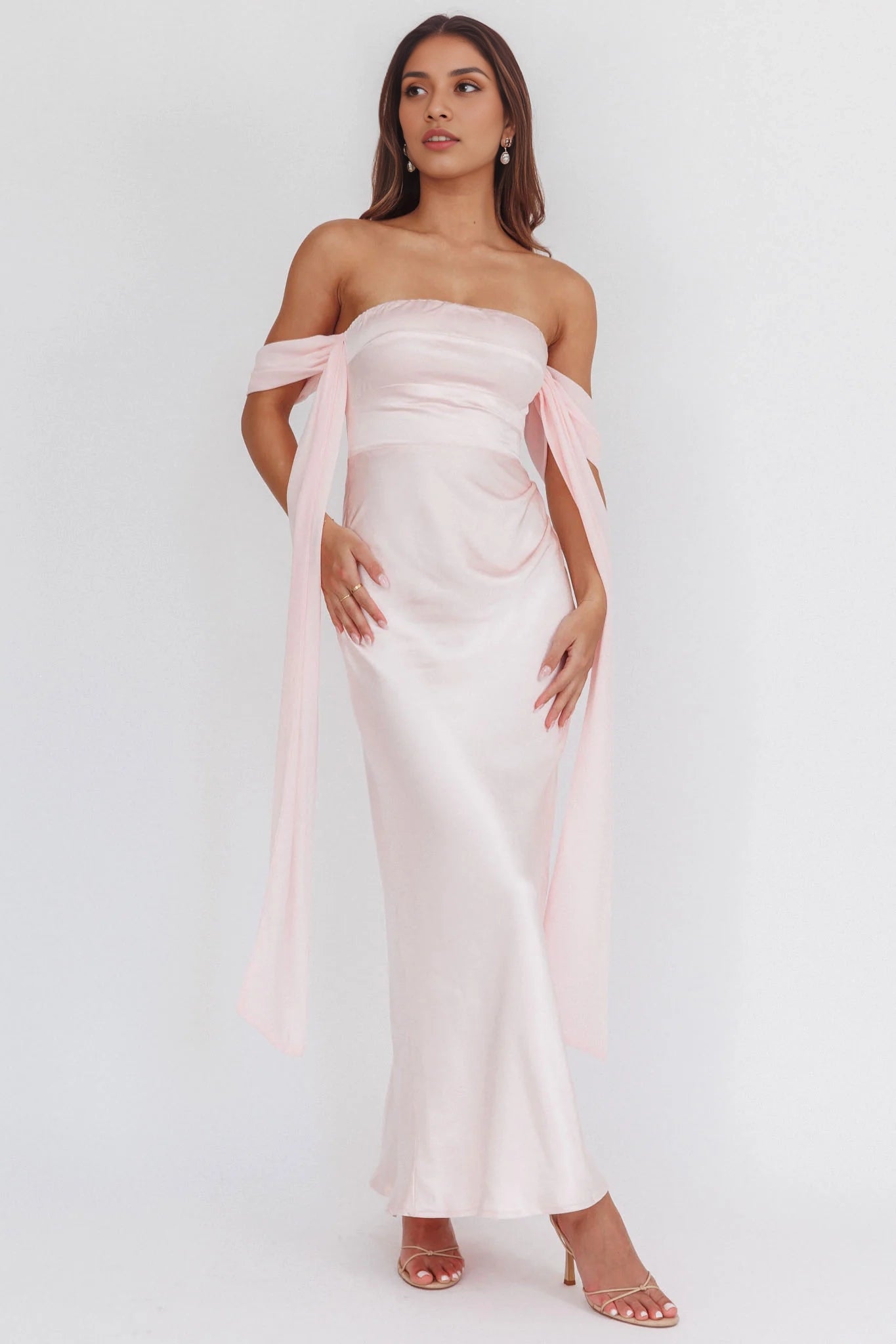 Enchanting drooping sleeves and extra long off shoulder design create stunning bridesmaid dresses