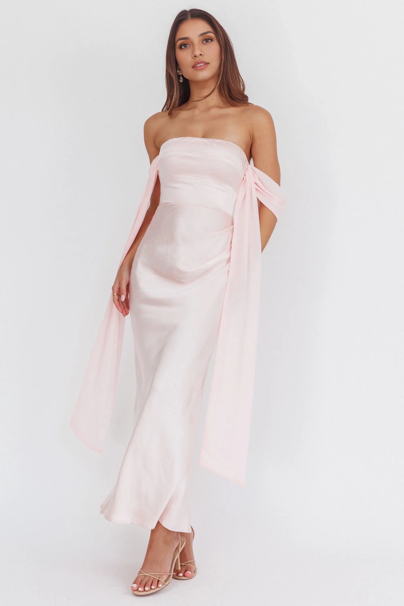 Enchanting drooping sleeves and extra long off shoulder design create stunning bridesmaid dresses