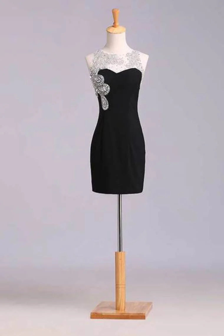 The short mini dress is adorned with chiffon beads and chiffon beads