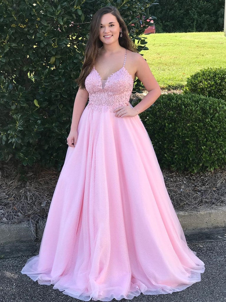 Large pink sheer spaghetti strap with V-neck princess floor length dress paired with lace ball dress