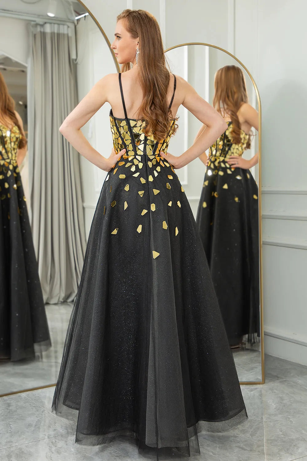 Sparkling black and gold A-line spaghetti strap with sequined ball dress