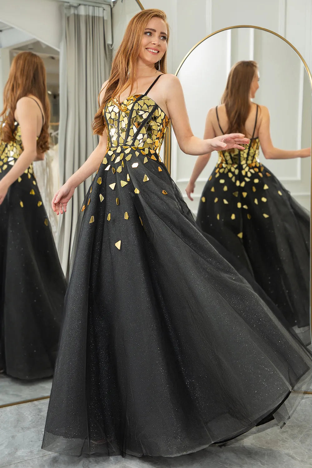 Sparkling black and gold A-line spaghetti strap with sequined ball dress