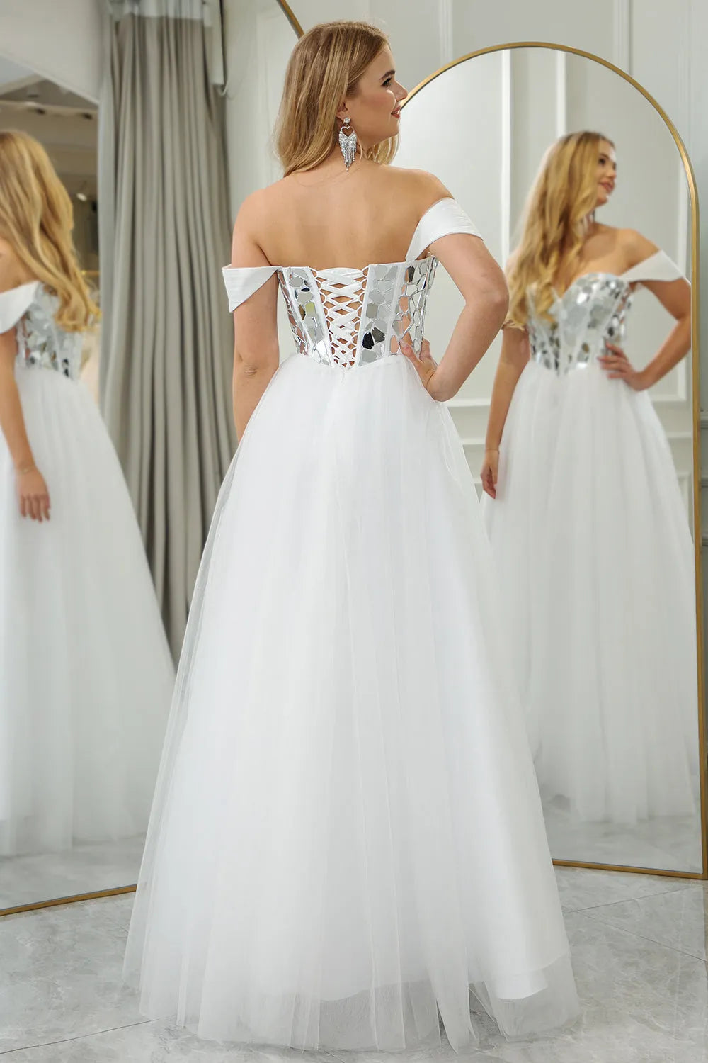 Elegant slim fitting white one shoulder long sheer ball dress