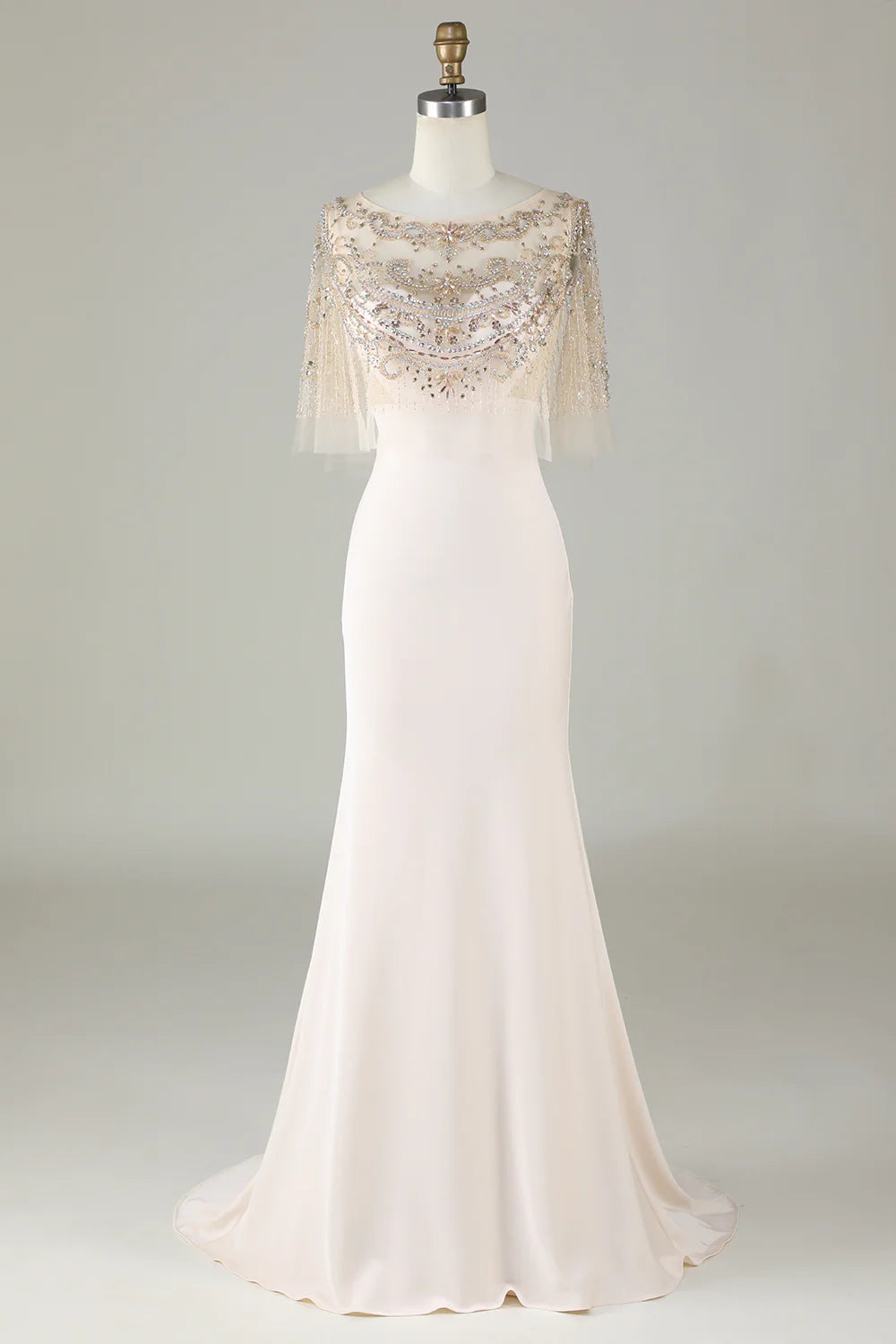Sparkling and elegant champagne colored boat neck beaded mermaid long ball dress