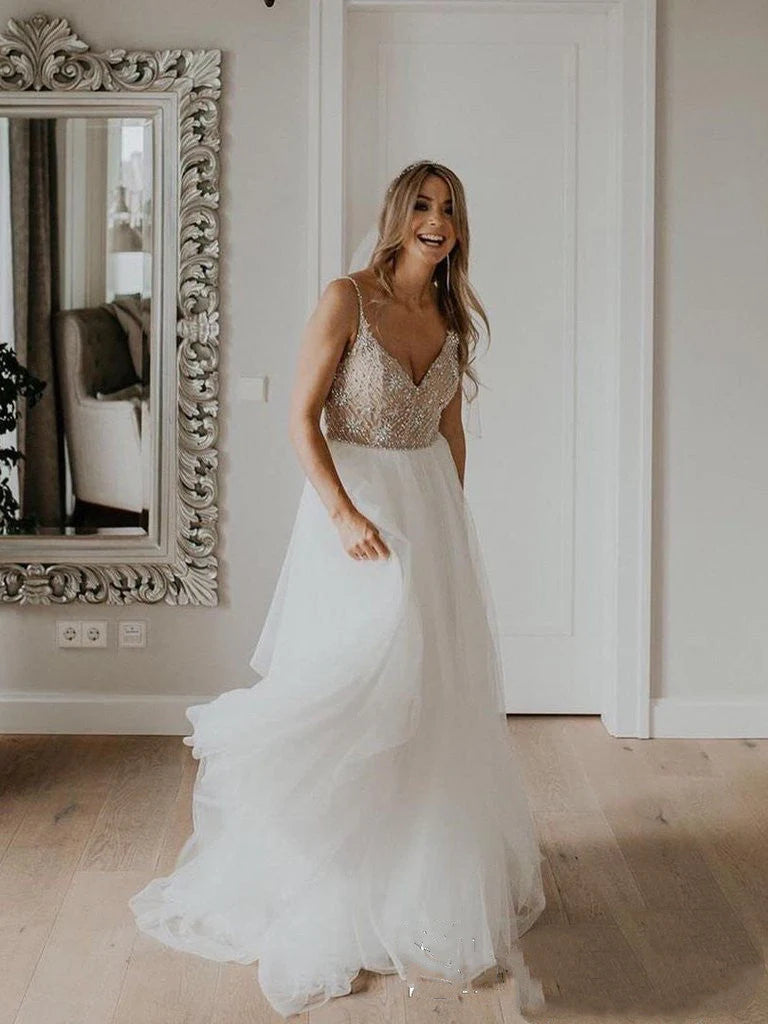 Diamond shoulder strap with full pearl embellishment neckline wedding dress paired with sequin sheer wedding dress