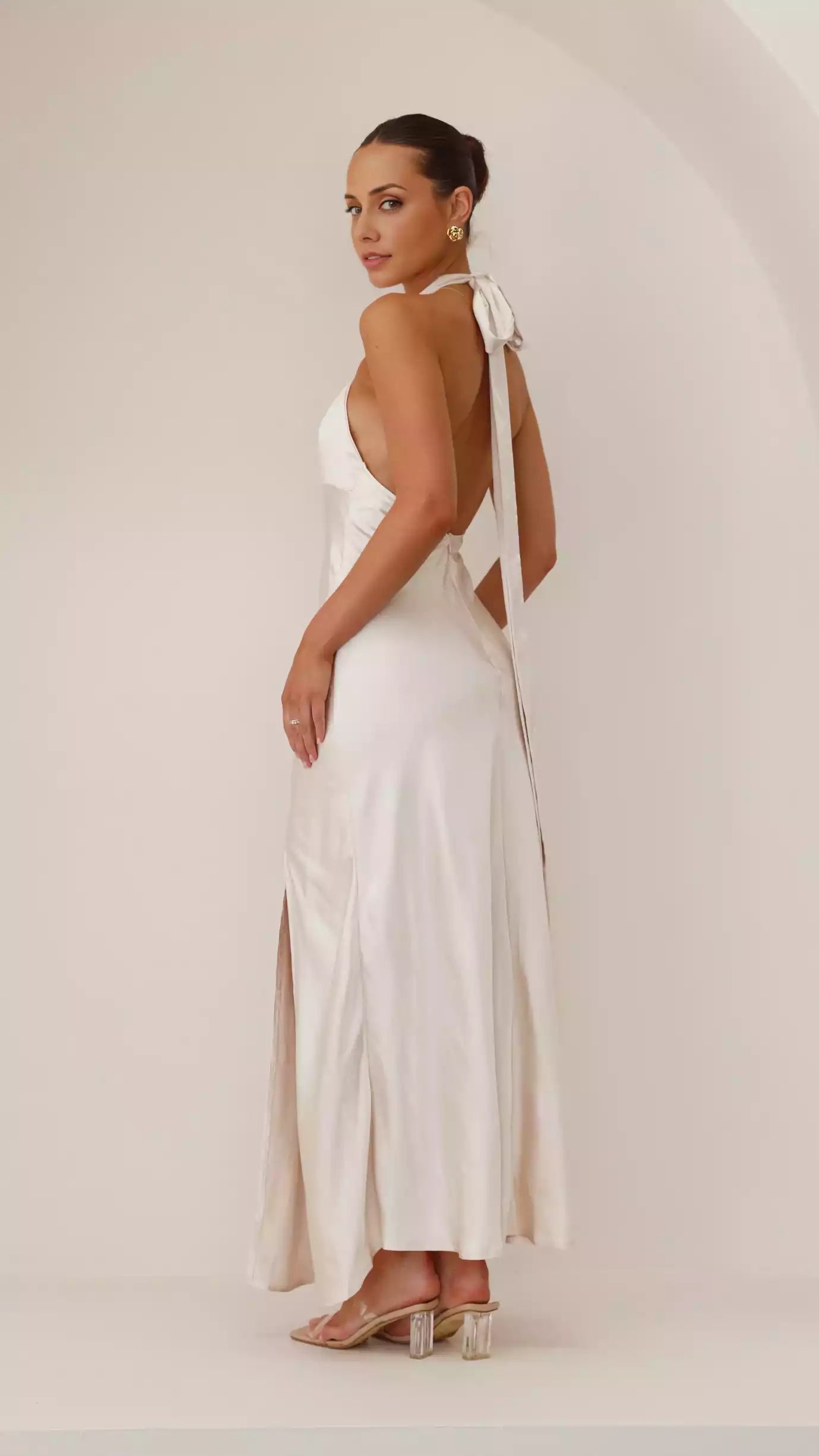 Stunning backless sling with adjustable neck strap, side slit, hidden zipper at the back Prom Dresses