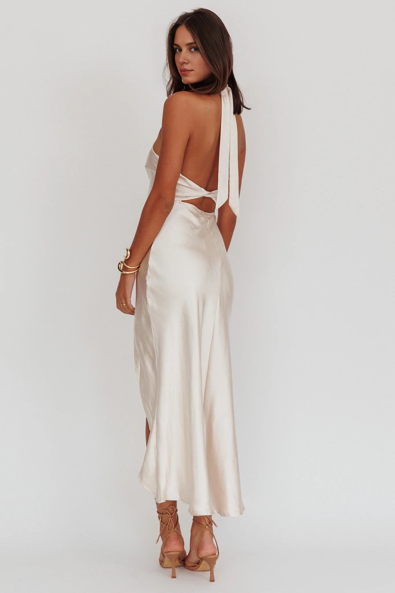 The eye-catching satin hanging neck, long leg slit, backless twisted bridesmaid dress