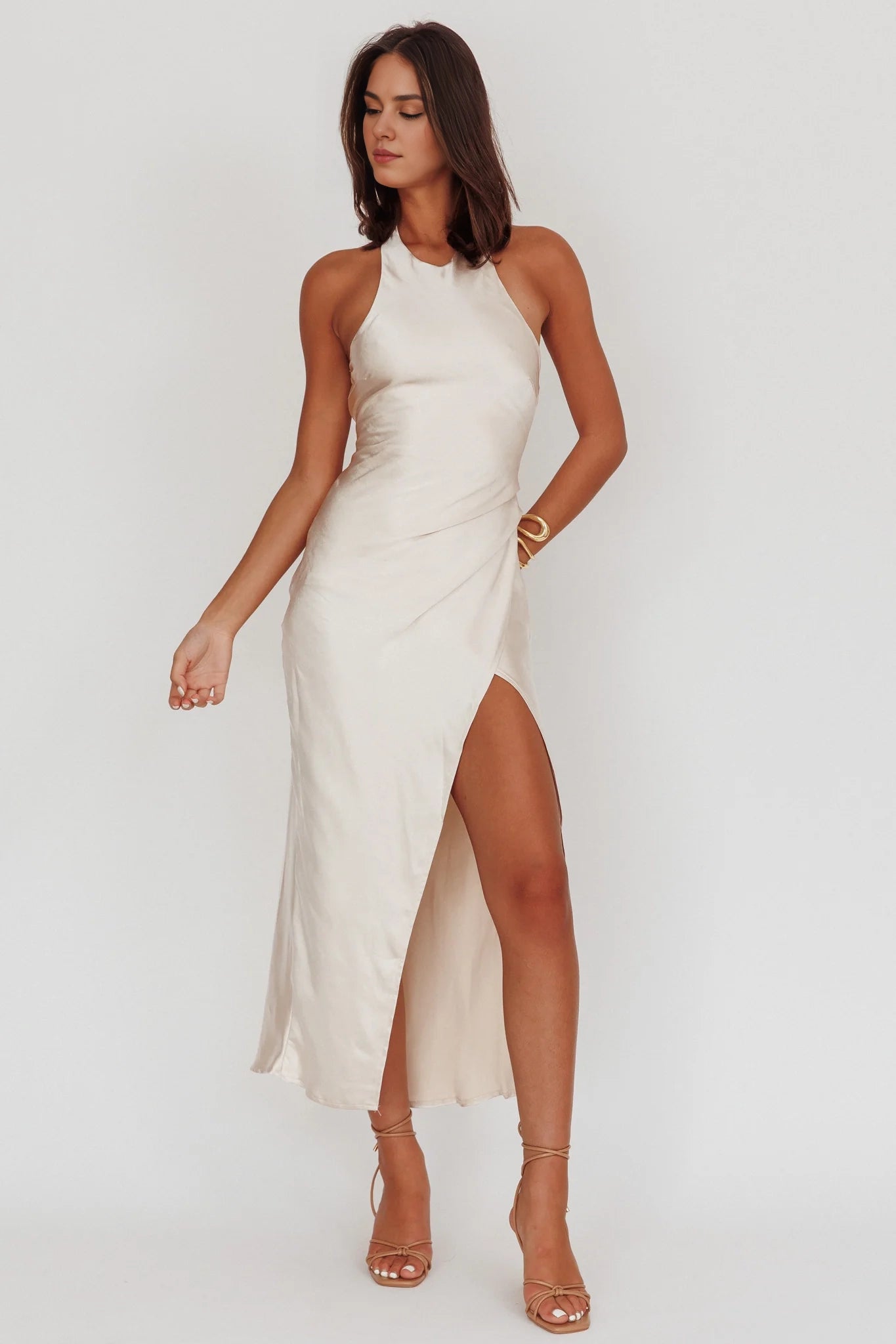 The eye-catching satin hanging neck, long leg slit, backless twisted bridesmaid dress