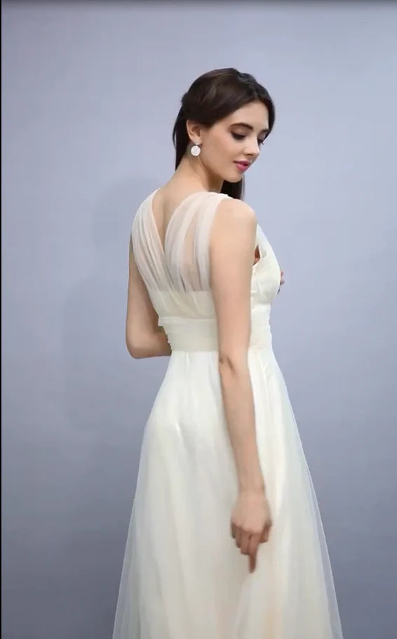 Elegant sheer V-neck bridesmaid dress with A-line ruffled edge and floor length skirt