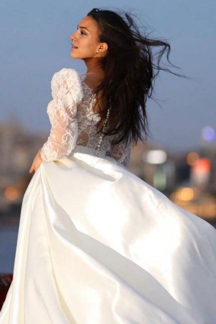 Unique long sleeved V-neck satin lace bridal gown