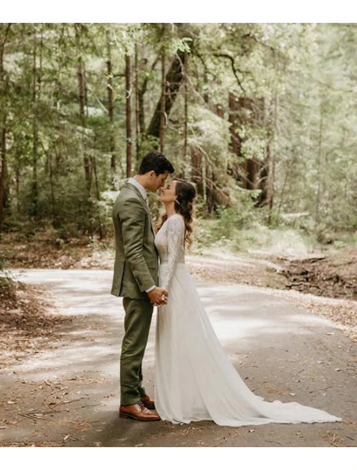 Beach backless bohemian style wedding dress A-line low round neck long sleeved brush lace bridal dress with pleats