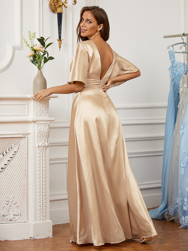 A-line princess style silk pleated V-neck short sleeved ground length dress