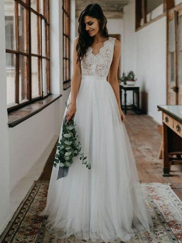 A-shaped elegant princess style sheer lace V-neck sleeveless ground length wedding dress
