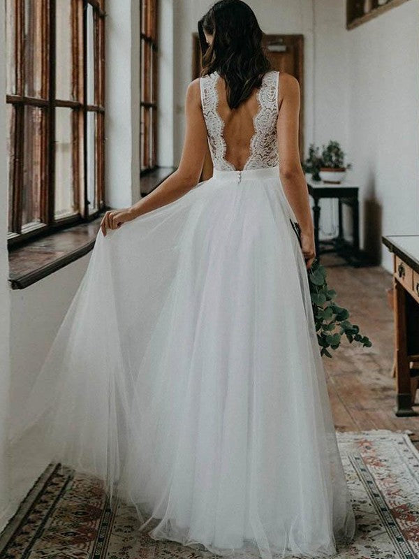 A-shaped elegant princess style sheer lace V-neck sleeveless ground length wedding dress