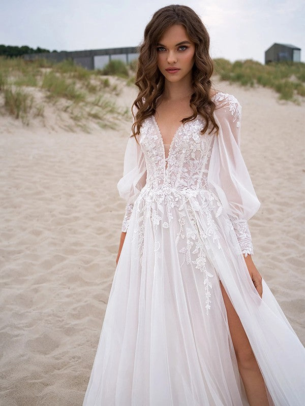 A-line princess style lace decal V-neck long sleeved large hem wedding dress