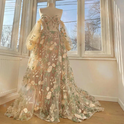 Long sleeved sweet and elegant sheer dance dress adorned with pearls and decals
