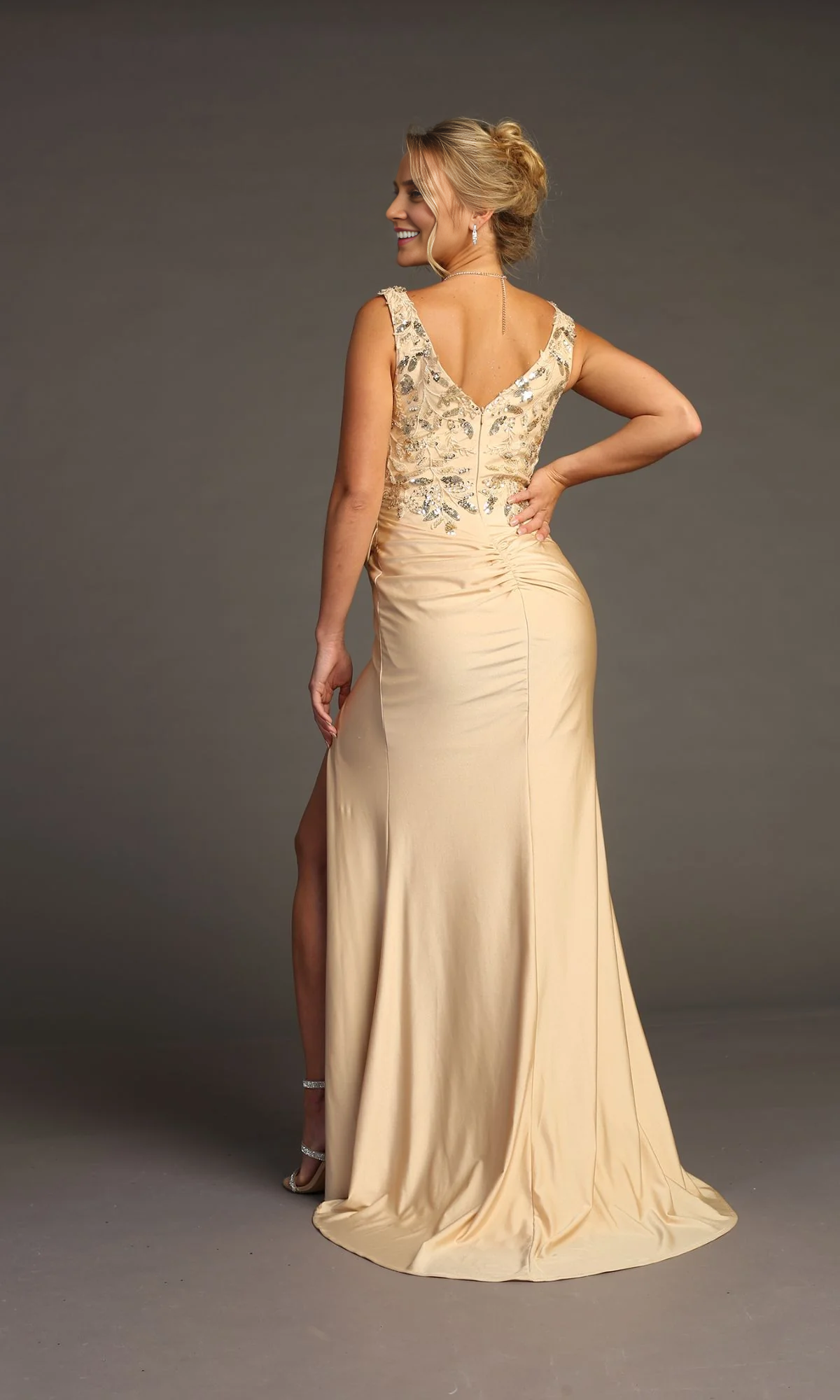 OKBBN's charming sequined tight fitting long ball gown