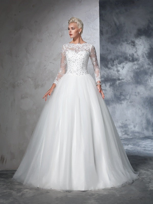 Beautiful and elegant lace long sleeved wedding dress