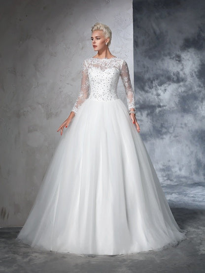 Beautiful and elegant lace long sleeved wedding dress