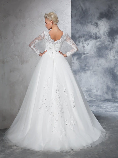 Beautiful and elegant lace long sleeved wedding dress