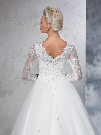 Beautiful and elegant lace long sleeved wedding dress