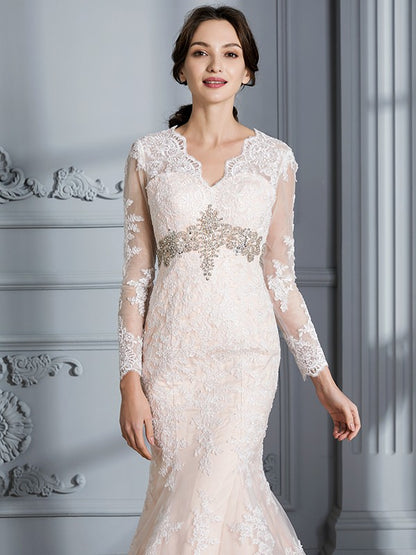 Slim fit mermaid V-neck beaded long sleeved strapless tulle wedding dress