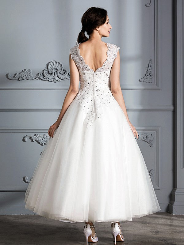 Elegant sleeveless tea long knee length sheer wedding dress