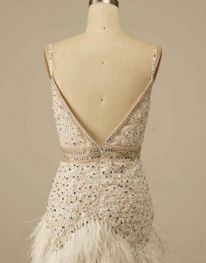 Gorgeous and elegant white spaghetti strap adorned with feathers in the back to school dress