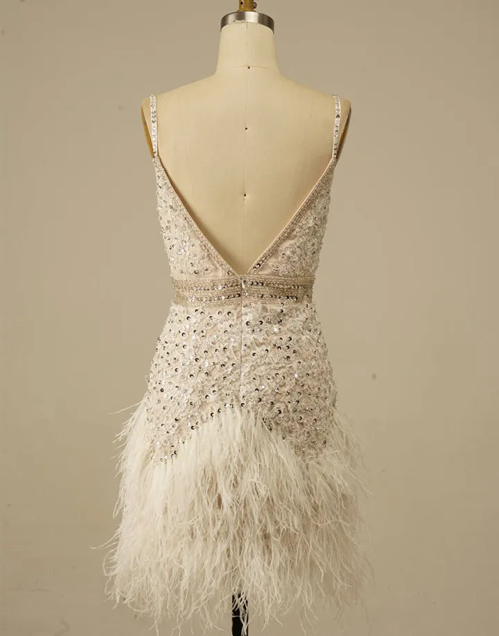 Gorgeous and elegant white spaghetti strap adorned with feathers in the back to school dress