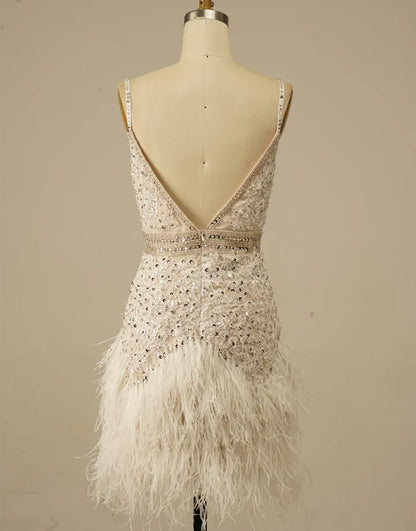 Gorgeous and elegant white spaghetti strap adorned with feathers in the back to school dress