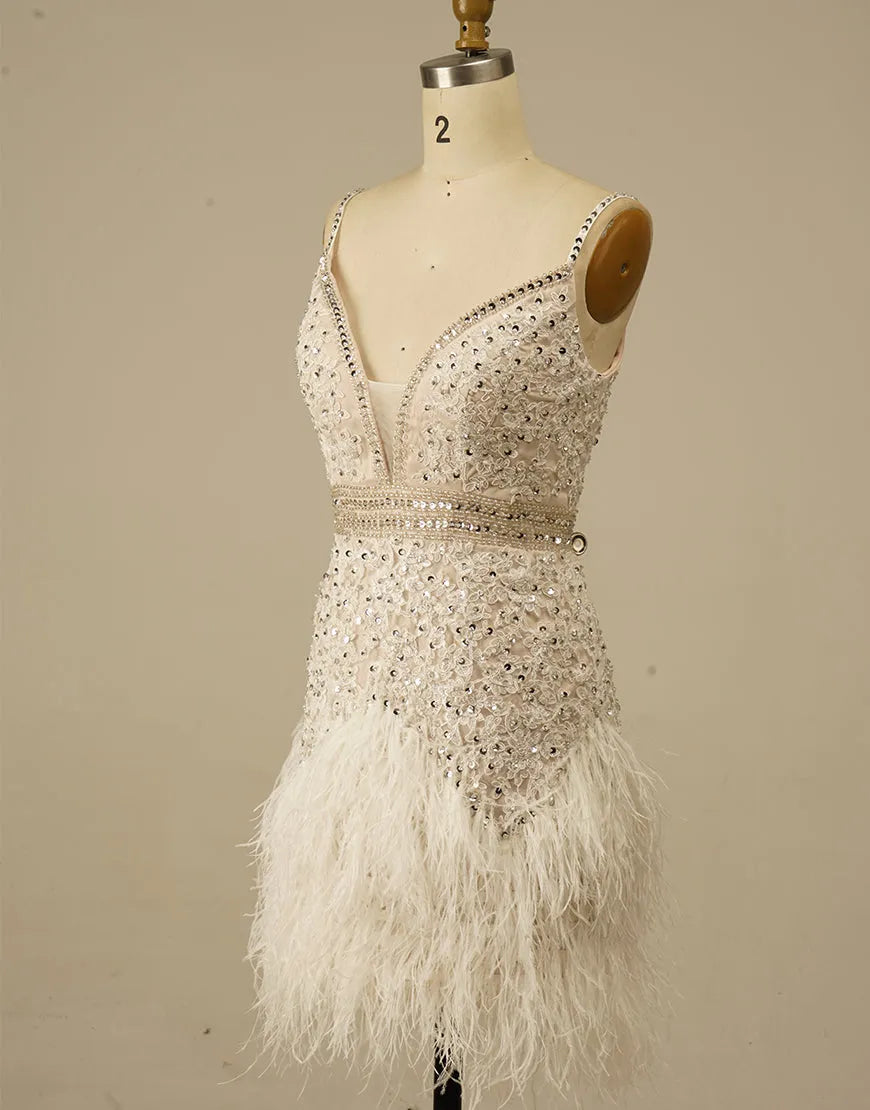Gorgeous and elegant white spaghetti strap adorned with feathers in the back to school dress