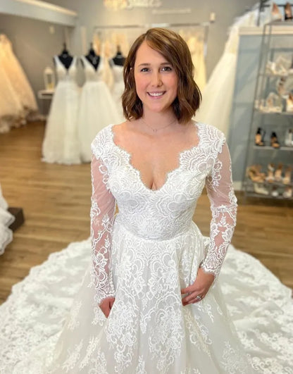 Sweet and elegant A-line V-neck long sleeved church skirt lace wedding dress