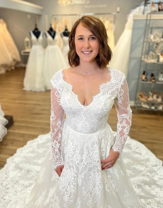 Sweet and elegant A-line V-neck long sleeved church skirt lace wedding dress