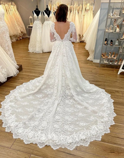 Sweet and elegant A-line V-neck long sleeved church skirt lace wedding dress