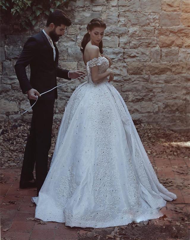Stunning and elegant long off shoulder lace beaded wedding dress