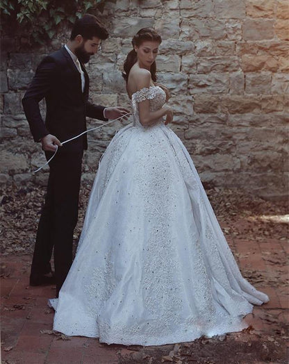 Stunning and elegant long off shoulder lace beaded wedding dress