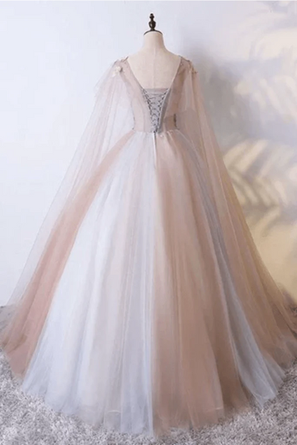 V-neck sheer ball dress with unique embellishments and floor sweeping one-fifth dress