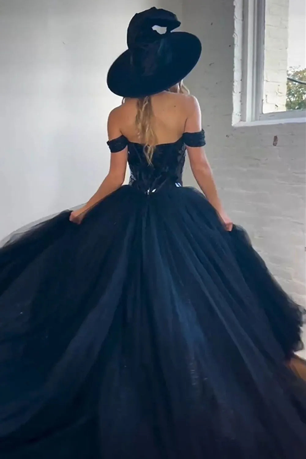 Elegant black A-line off shoulder mirror top with slit long sheer ball dress