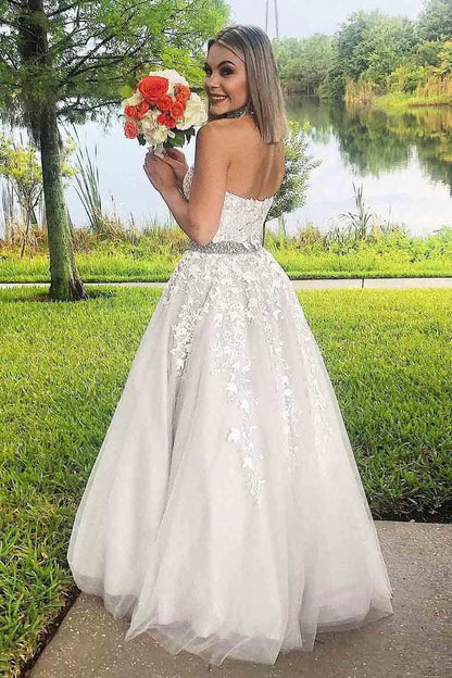 A charming high necked dance dress with a long lace formal dress